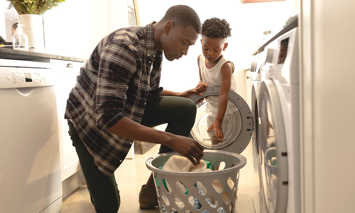 Parent using washing machine