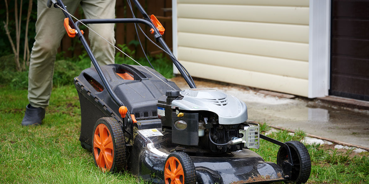 Lawn mower height adjustment